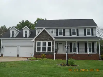 Complete Outdoor Home Enhancement — Home Renovation & Remodeling Services project by Kingsford Siding, Windows & Patio Rooms