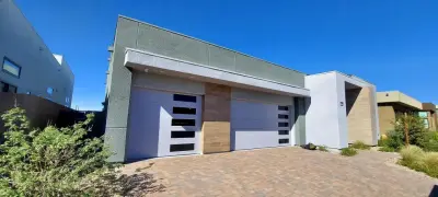 Garage Door Solutions — Home Renovation & Remodeling Services project by Filli's Garage Doors & Iron Works