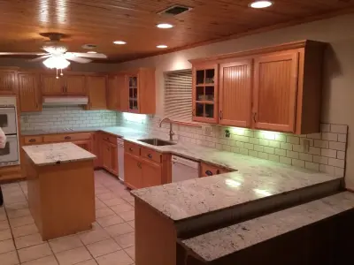 Stone surface and wall paneling — Home Renovation & Remodeling Services project by Bliss Contracting LLC