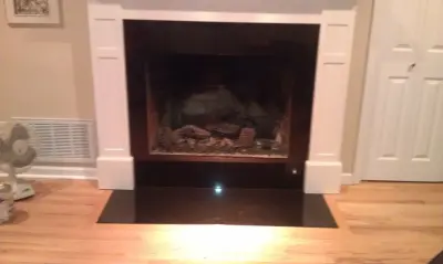 Stone Hearth Enclosure — Home Renovation & Remodeling Services project by J. Trent & Associates, LLC