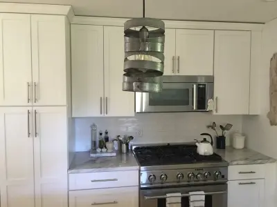 Elegant White Kitchen — Home Renovation & Remodeling Services project by Martinelli Building And Contracting, LLC
