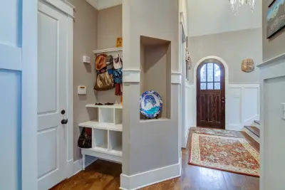 Eco-Friendly Laundry Cabinets and Mudroom Storage — Home Renovation & Remodeling Services project by Dunn Development, Inc.