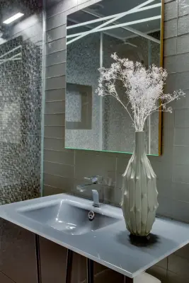 Jericho Guest Bathroom - An Opulent and Striking Retreat by Reyes Brothers Remodeling & Design LLC