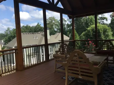 Partial Roof Elevated Composite Deck — Home Renovation & Remodeling Services project by Crippen Woodworks
