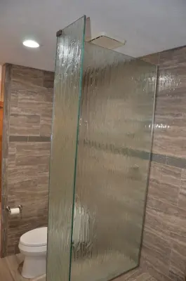 Hawaiian Village primary bathroom — Home Renovation & Remodeling Services project by Goodwin Custom Contracting