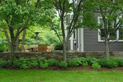 Williston Terrace, Walls and Water Feature by Church Hill Landscapes, Inc.