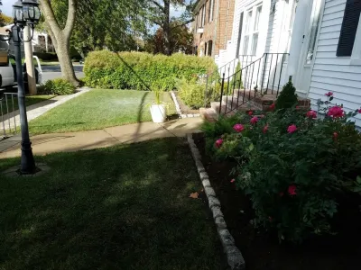edging and bluestone — Landscape Construction project by City & Estate Gardener in Providence