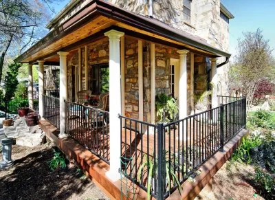 Front yard entry, steps, retaining walls and porch — Landscape Construction project by Classic Stonescaping & Gardens