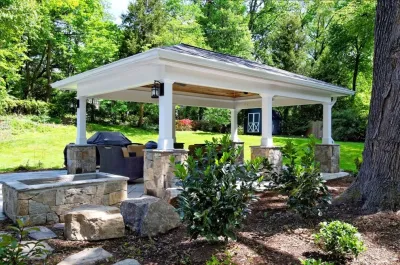 Backyard Pavillon with patio and fire pit — Landscape Construction project by Classic Stonescaping & Gardens