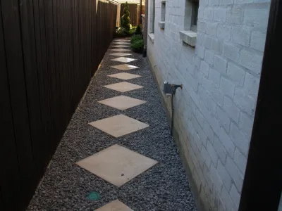 Limestone walkways with stepping stones — Landscape Construction project by Clean Cut Landscape Co in New Orleans