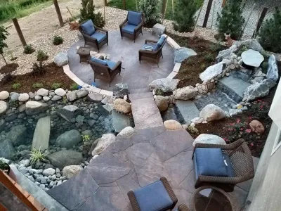 Johnstown New Construction Backyard with Pond and Patio — Landscape Construction project by Colorado Vista Landscape Design, Inc.