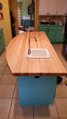 Isle Surface — Home Renovation & Remodeling Services project by Aikins Custom Woodwork