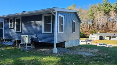 Clarke Building Company - Roofing & Gutter Services in Newbury, MA