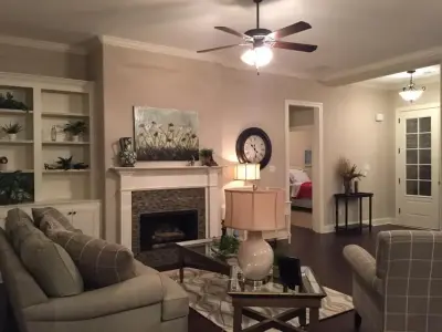 Dark Hardwood Flooring Model Home — Carpet Installation project by Builders' Floors & Interiors
