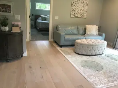 lightened wood flooring — Carpet Installation project by Mel's Carpet Outlet