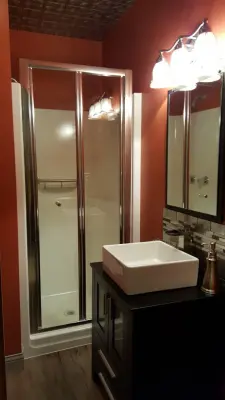 Tile Ceiling Bathroom Remodel by Nu-Bath And Kitchen Inc.