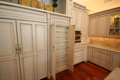 Timeless Charm with Concealed Pantry — Kitchen Remodeling project by Walters Cabinets, Inc.