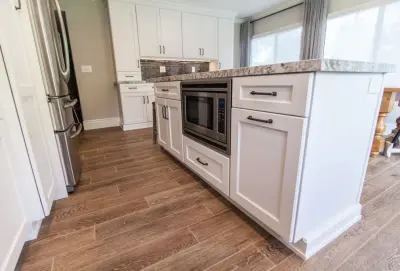 Omega Cabinetry, Renner door design in Pearl finish — Kitchen Remodeling project by Kitchens Etc. Of V.C.