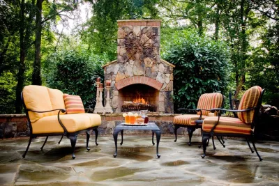 STONE FIREPLACE ADDITION by Coogan's Design Build