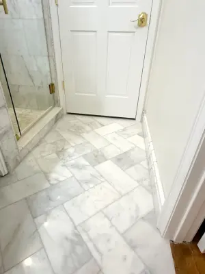 Osceola Visitor Marble Bathroom — Kitchen Remodeling project by Collins Kitchen And Bath