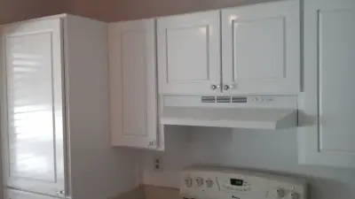 Cabinet Refurbishment with Paint in the Kitchen — Kitchen Remodeling project by Design Decorating & Kitchens LLC