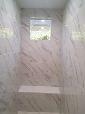 Quartz Bath Suite with Shower Enclosure, Vanity, and Countertops — Kitchen Remodeling project by HomRem LLC
