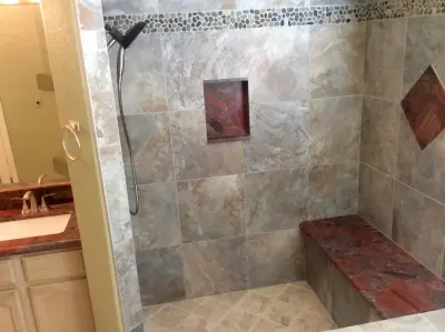Crimson Stone Bathroom Renovation — Kitchen Remodeling project by Amos Tile LV
