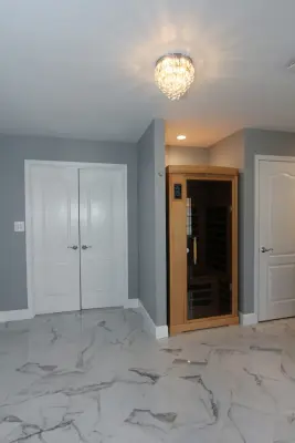 Reisterstown Elegant Sauna and Marble Master Bathroom — Kitchen Remodeling project by Taylor Made Custom Contracting Inc.