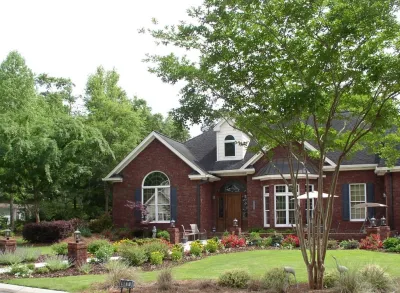 Welcoming Cottage Entrance by Creative Landscapes, Inc.