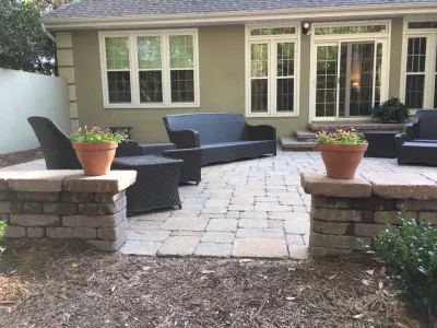 Traditional Stone Patio with Sitting Walls — Landscape Construction project by Creative Landscapes, Inc. in Pawleys Island