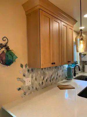Artistic Two-Tone Kitchen in Shelby Township — Kitchen Remodeling project by Kopke Remodeling & Design