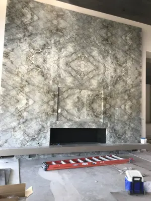 Stone hearth fireplace — Kitchen Remodeling project by Amos Tile LV
