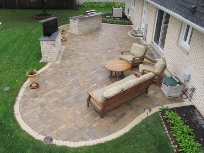 Darien, IL Paver Patio, TV Stand and Grilling Station — Landscape Construction project by D & M Outdoor Living Spaces