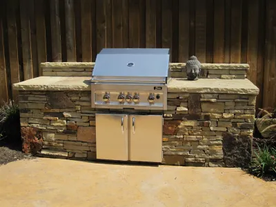 Dry Stack Stone - Plano, TX — Landscape Construction project by Dallas Outdoor Kitchens & Hardscape in Plano