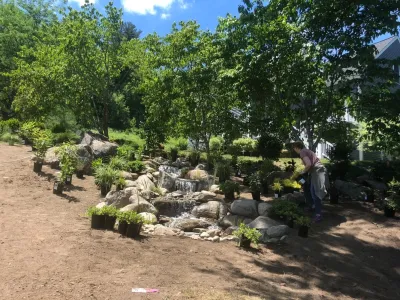 Waterfall Side Yard — Landscape Construction project by Downer Brothers Landscaping, Inc. in North Andover