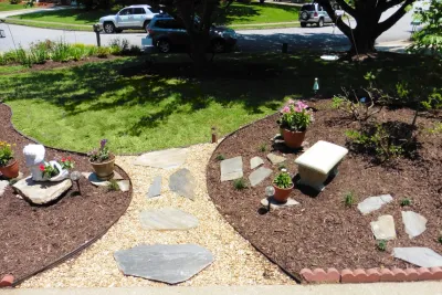 Bringing back an overgrown landscape by Dr. Dan's Landscaping & Architectural Design