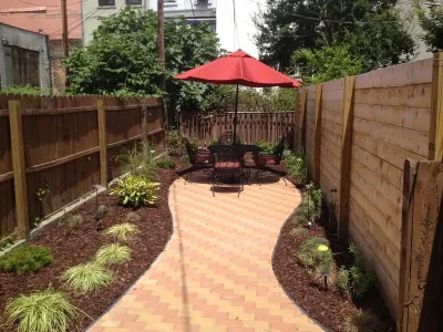 Brooklyn - Brownstone Backyard Brick Patio & Garden Installation — Landscape Construction project by Dragonetti Brothers Landscapes in New York