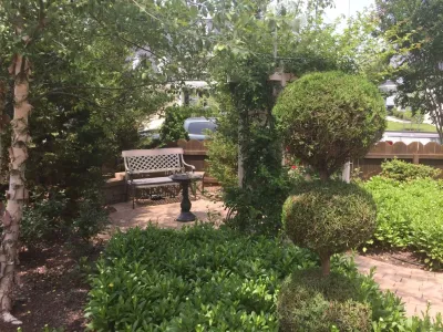 Formal Garden Seating Area — Landscape Construction project by Dreamscape Designers Landscape Company in Virginia Beach