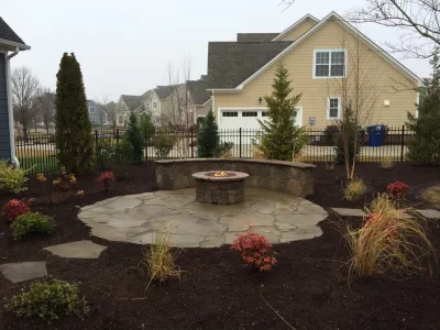 Natural Stone Patio with Firepit — Landscape Construction project by Dreamscape Designers Landscape Company in Virginia Beach