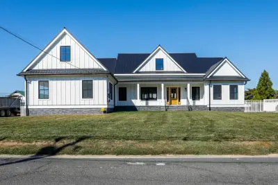 A Contemporary Rustic Farmhouse — Custom Home Builders project by Baine Contracting, Inc.