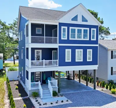 Aman Personalized Coastal Retreat — Custom Home Builders project by Bay To Beach Builders