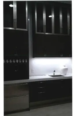 Expansive Tailored Floor-to-Ceiling Cabinetry — Kitchen Remodeling project by Home Design Construction