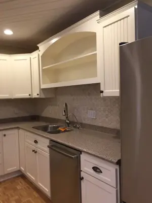 Linen Beadboard Cabinet Refacing in Craftsman Style — Kitchen Remodeling project by Kitchen Solvers Of Madison
