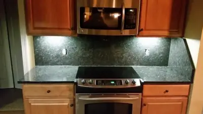 Granite Countertop in Steel Grey with Complete Backsplash — Kitchen Remodeling project by SGTops LLC