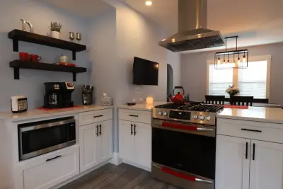 Stoneham Culinary and Laundry Room — Kitchen Remodeling project by Godfrey Design-Build, LLC