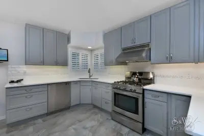 modern kitchen featuring gray cabinetry — Kitchen Remodeling project by Laura Scott - S & W Kitchens