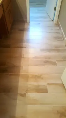 Travertine Restrooms — Kitchen Remodeling project by Zendo Renovations