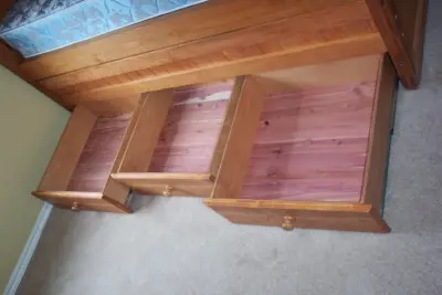 Storage bed with pull-out drawers by Texas Woodworks
