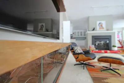 Wall-Mounted TV Cabinet and Shelf — Kitchen Remodeling project by Blue Terra Design