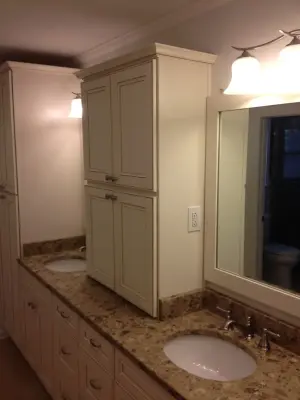 Vanity, countertops, lobby flooring, and shower area — Kitchen Remodeling project by Granite Marble Products